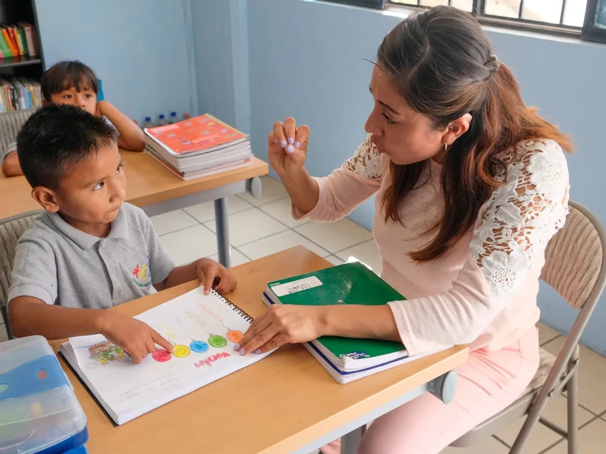 A teacher working one-on-one with a student